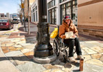 Disabled vet working the Gateway mall